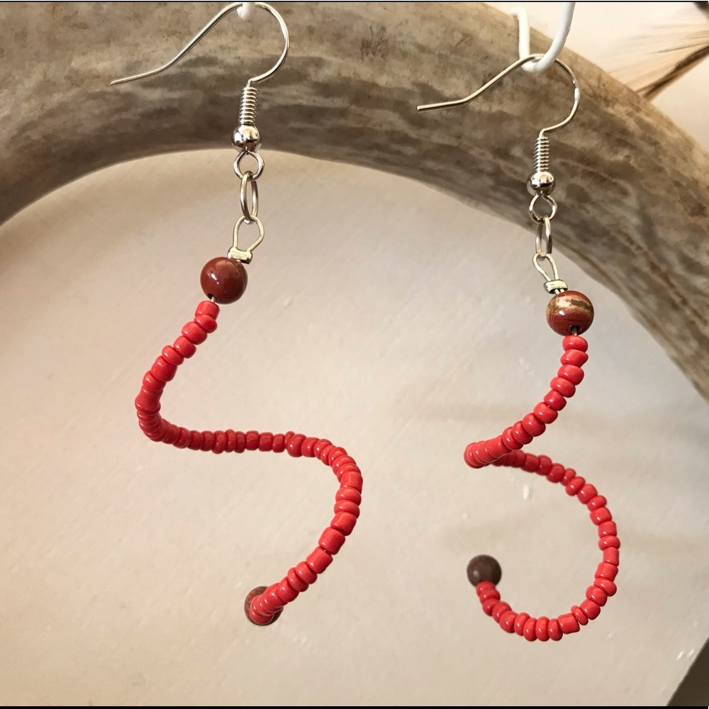 Coral glass bead spiral earrings